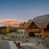 Street view of Hotel Canoe and Suites at sunset