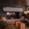 Roaring Fire with empty seating at the Otter Hotel