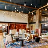 Lobby lounge area at Hotel Thaynes with comfy chairs and rugs