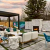 lounge chairs outside with fireplace