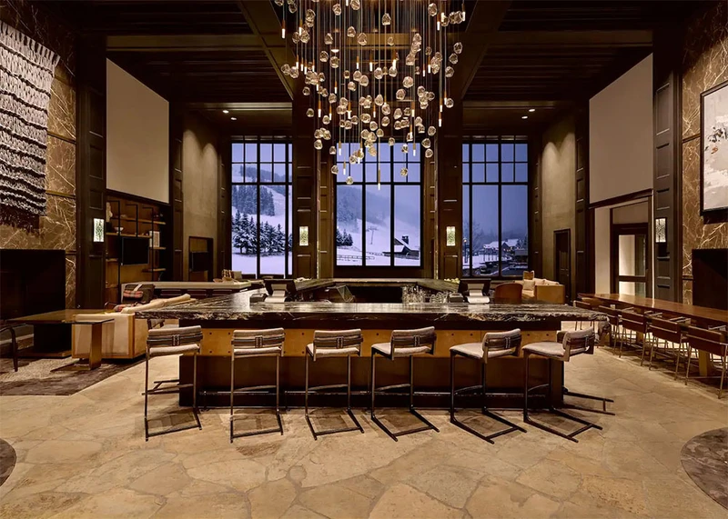 Tables overlooking a winter mountain scene in the Park Hyatt Resort & Spa