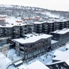 Aerial photo in winter of Riddergaarden Mountain Lodge by Borre Wickstrøm
