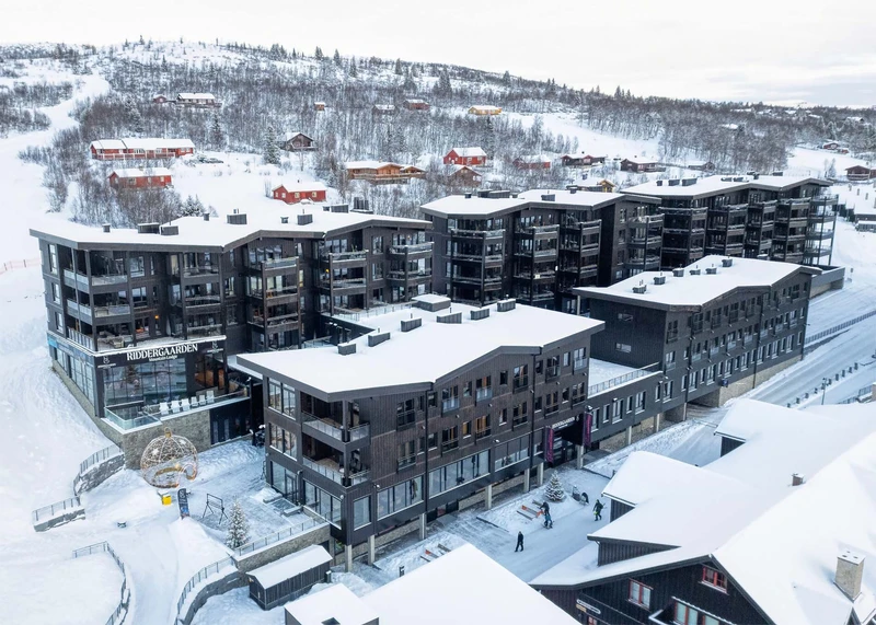 Aerial photo in winter of Riddergaarden Mountain Lodge by Borre Wickstrøm