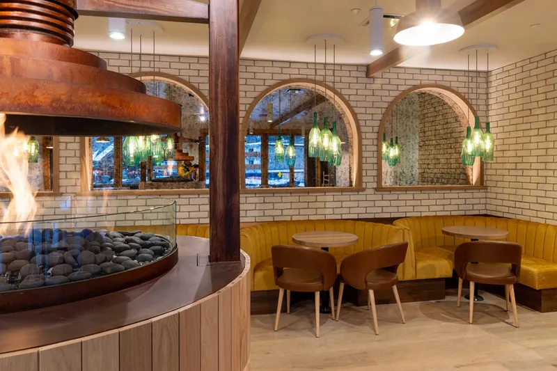 Tables ready for diners at the Sudden Sally Restaurant at Hotel Canoe and Suites