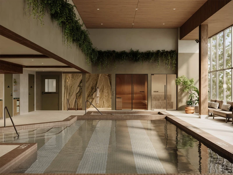 The empty Nora Swimming Pool lit by a warm morning sunlight © The Kenrick Hotel