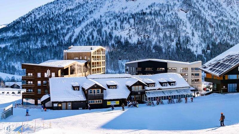 Myrkdalen Hotel and Apartments, exterior buildings in winter, Norway - Sverre Hjornevik