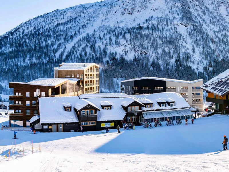 Myrkdalen Hotel and Apartments, exterior buildings in winter, Norway - Sverre Hjornevik